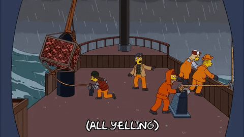 A scene from The Simpsons of fishermen in orange waterproofs struggling on a storm-tossed boat deck, captioned “(all yelling)”